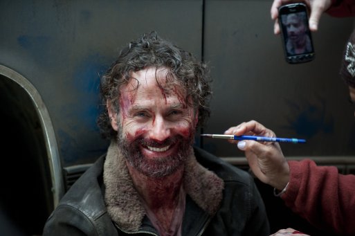Bloody make-over between takes. Andrew Lincoln seems happy about his new look.